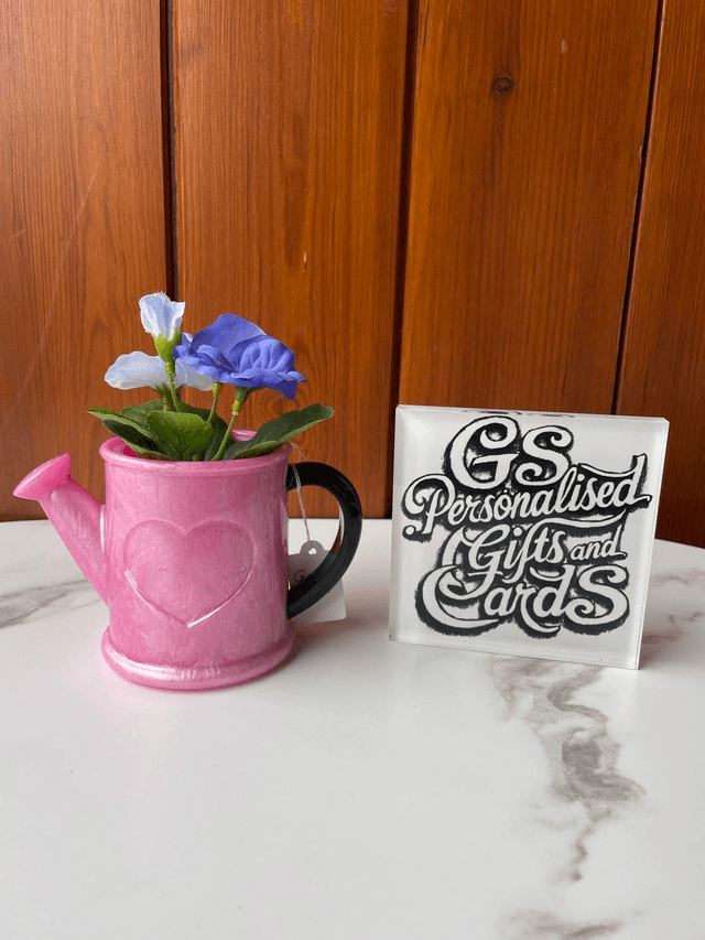 Resin watering can